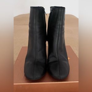 leather boots with wooden heels